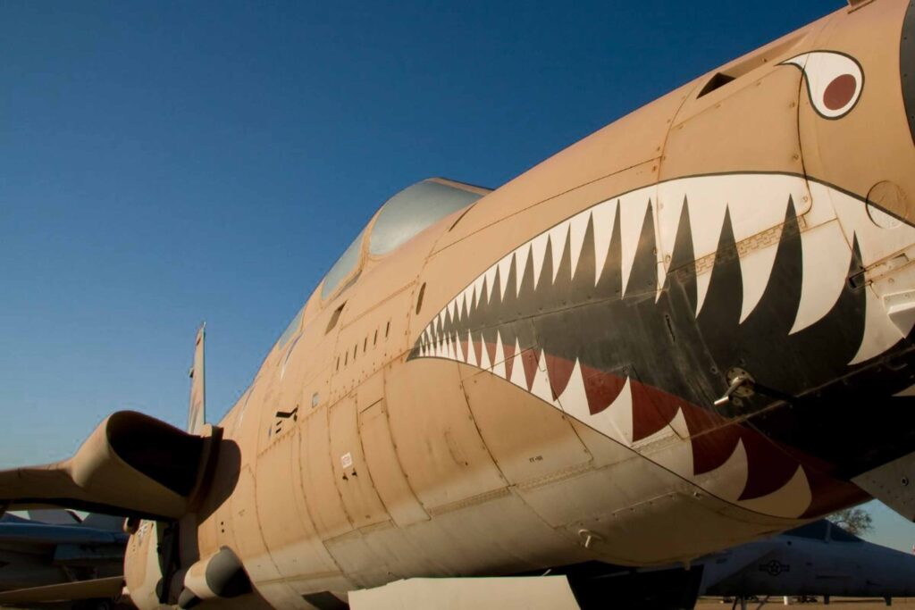 Historic airplane at the Pima Air and Space Museum that is painted with shark teeth